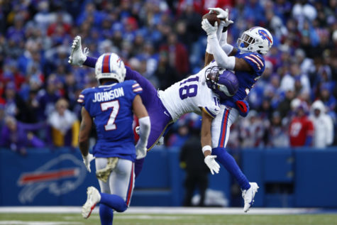 ORCHARD PARK, NEW YORK - NOVEMBER 13: Justin Jefferson #18 of the Minnesota Vikings catches a pass in front of Cam Lewis #39 of the Buffalo Bills during the fourth quarter at Highmark Stadium on November 13, 2022 in Orchard Park, New York. (Photo by Isaiah Vazquez/Getty Images)