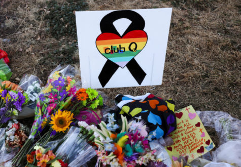 Floral tributes are placed in memory of the victims after a mass shooting at the Club Q gay nightclub in Colorado Springs, Colorado, U.S., November 20, 2022. REUTERS/Kevin Mohatt
