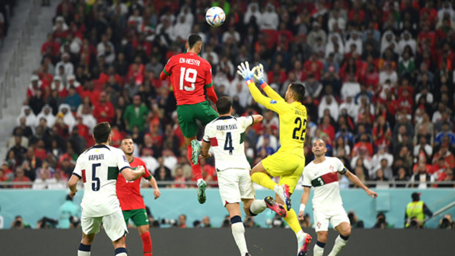Moroccan En-Nesyri jumps a record 9.1 ft(218 cm) to score the only goal in the game against Portugal