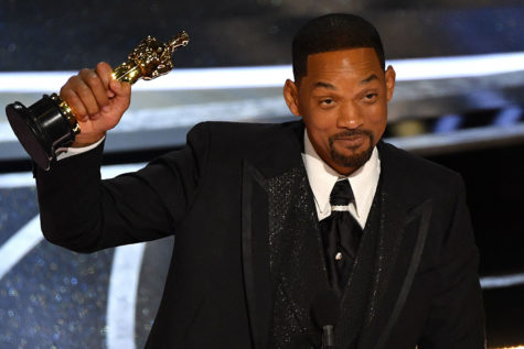 US actor Will Smith accepts the award for Best Actor in a Leading Role for King Richard onstage during the 94th Oscars at the Dolby Theatre in Hollywood, California on March 27, 2022. (Photo by Robyn Beck / AFP) (Photo by ROBYN BECK/AFP via Getty Images)