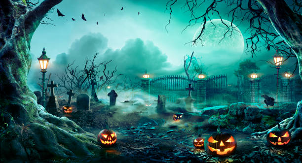 Jack o Lantern With Tombstones In The Spooky Cemetery - Halloween Background